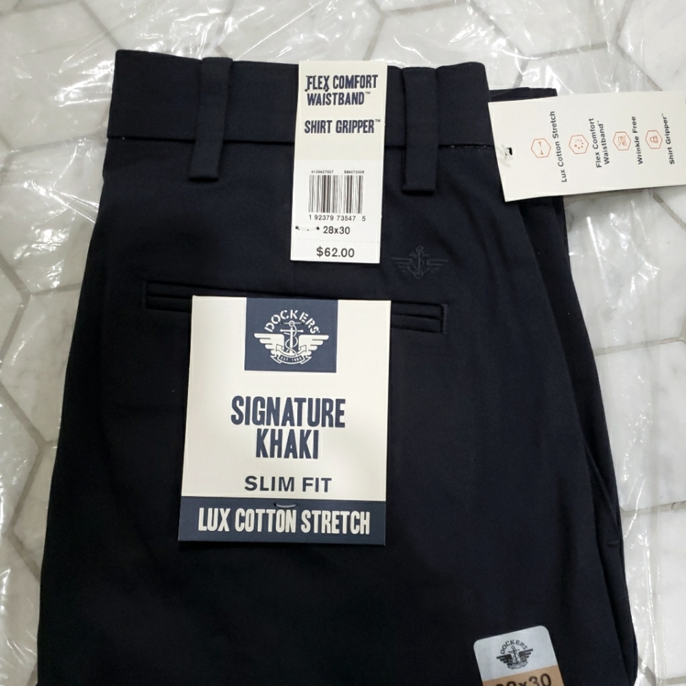 Back to school Dockers pants, new with tags, black. 28x 30 length see pictures